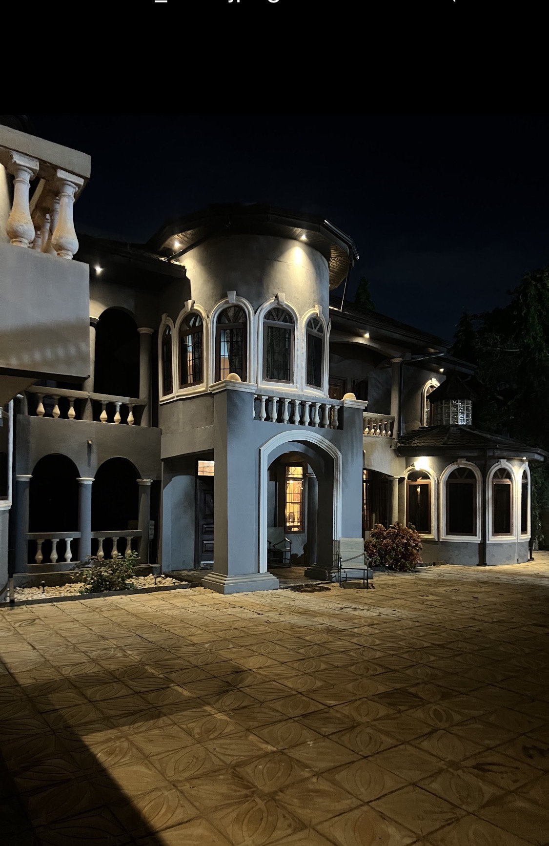 Royal Manor GH front exterior at night